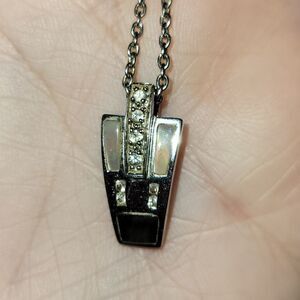 TJC STERLING SILVER pendant with 18" long necklace. ^